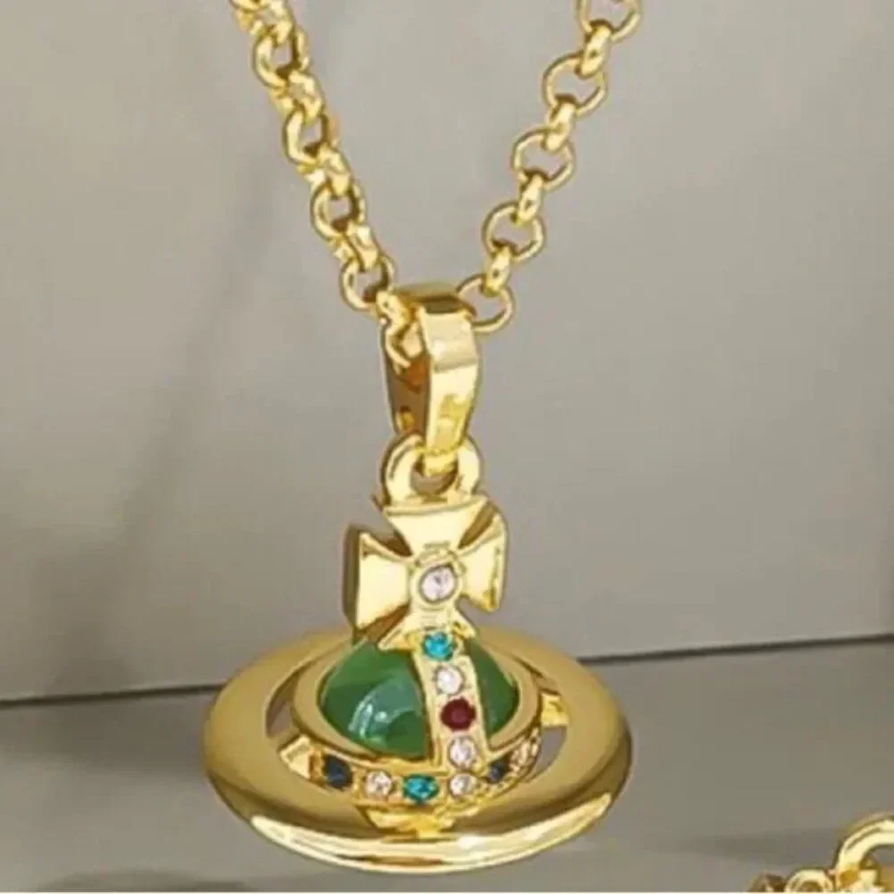 NIB Vivienne Westwood gold petite Saturn orb green crystal chain necklace